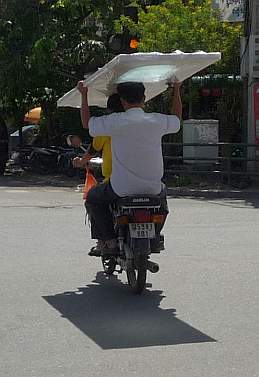 Carrying a door on a motorcycle
